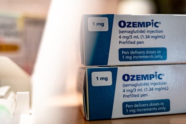 Two stacked boxes of Ozempic on a table.