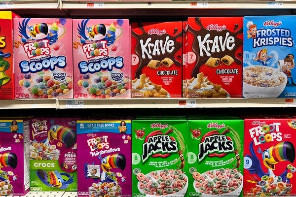 A view of boxes of Froot Loops, in multiple flavors with other Kellogg's cereals, on a grocery store shelf.