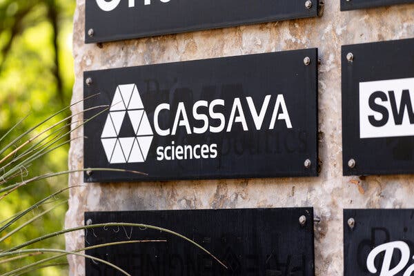 A sign bears the triangle logo of Cassava Sciences.