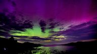 A meteor passes through the aurora borealis, also known as the northern lights, over The Bathing House in Howick, Northumberland on Monday night. Picture date: Monday August 12, 2024. PA Photo. Photo credit should read: Owen Humphreys/PA Wire