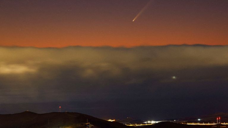 A view shows Comet C/2023 A3 (Tsuchinshan-ATLAS), known as the comet of the century, photographed before dawn from Temisas, on the island of Gran Canaria, Spain, September 28, 2024. REUTERS/Borja Suarez