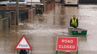 File photo dated 08/12/24 of a flood warden pushes a boat in floodwater in Greyfriars Avenue in Hereford, Herefordshire, after Storm Darragh hit the UK and Ireland. About one in five homes and businesses in England are in areas at risk of river, sea and flash flooding, analysis from the Environment Agency has warned. Issue date: Tuesday December 17, 2024.