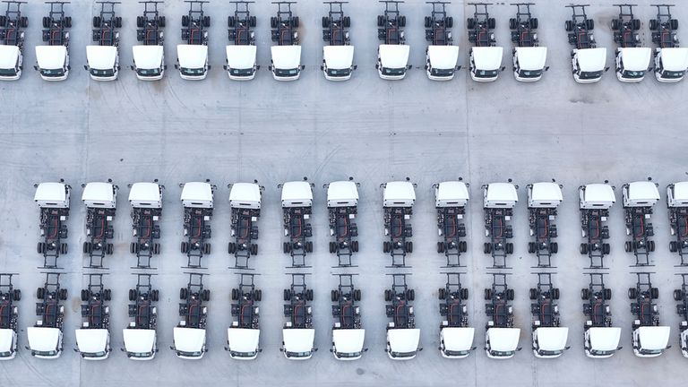 A view of new electric trucks at the parking lot of a BYD commercial vehicles subsidiary in Huai'an in east China's Jiangsu province Monday, Aug. 26, 2024.  (FeatureChina via AP Images)