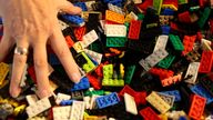 Rita Ebel, nicknamed "Lego grandma", builds a wheelchair ramp from donated Lego bricks in the living room of her flat in Hanau, Germany, February 17, 2020. Picture taken February 17, 2020. Ebel started to build the ramps almost one year ago to raise awareness for handicapped people in her hometown of Hanau. Meanwhile, dozens of stores use the ramps to ease entry for wheelchair users. REUTERS/Kai Pfaffenbach